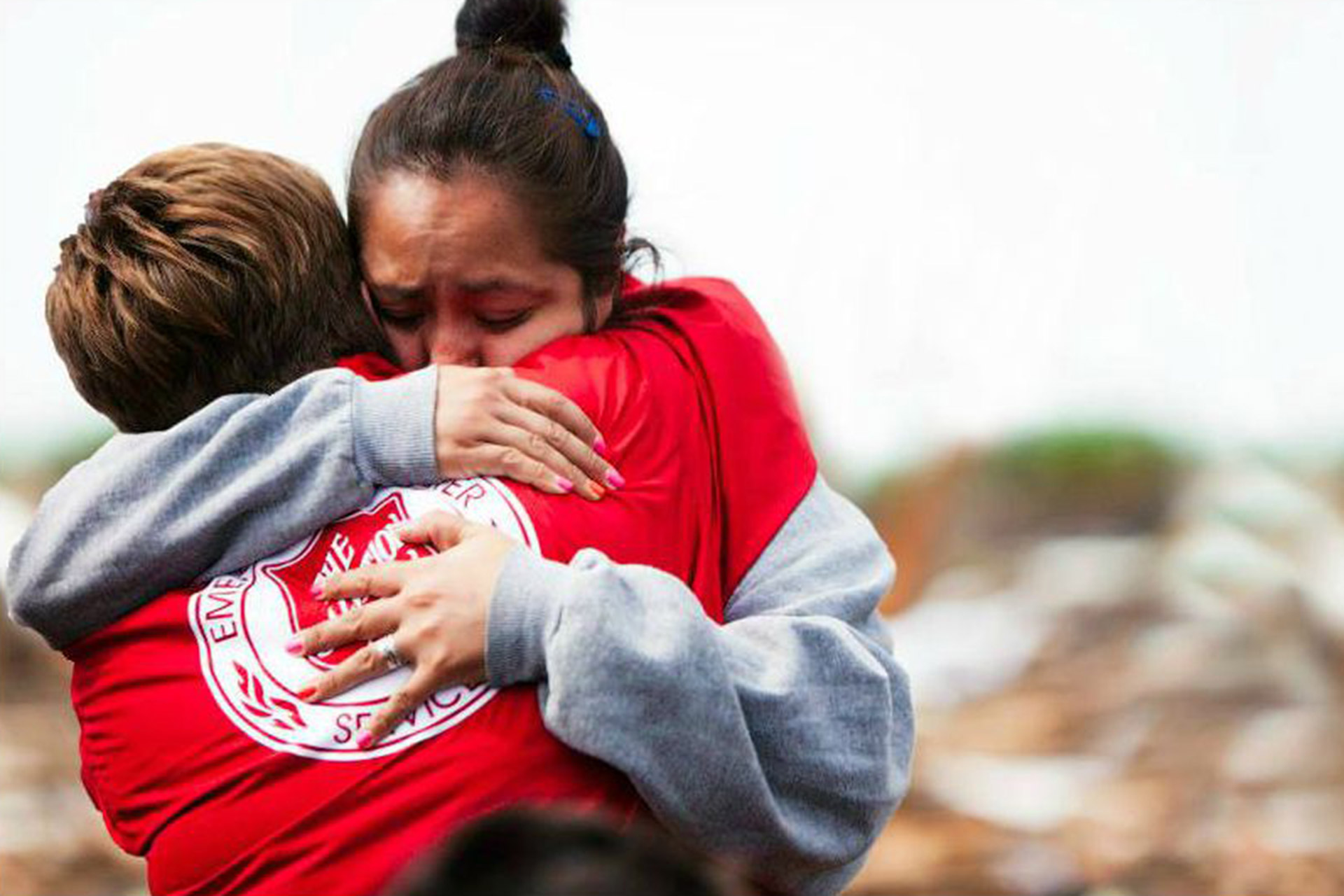 Two people hugging