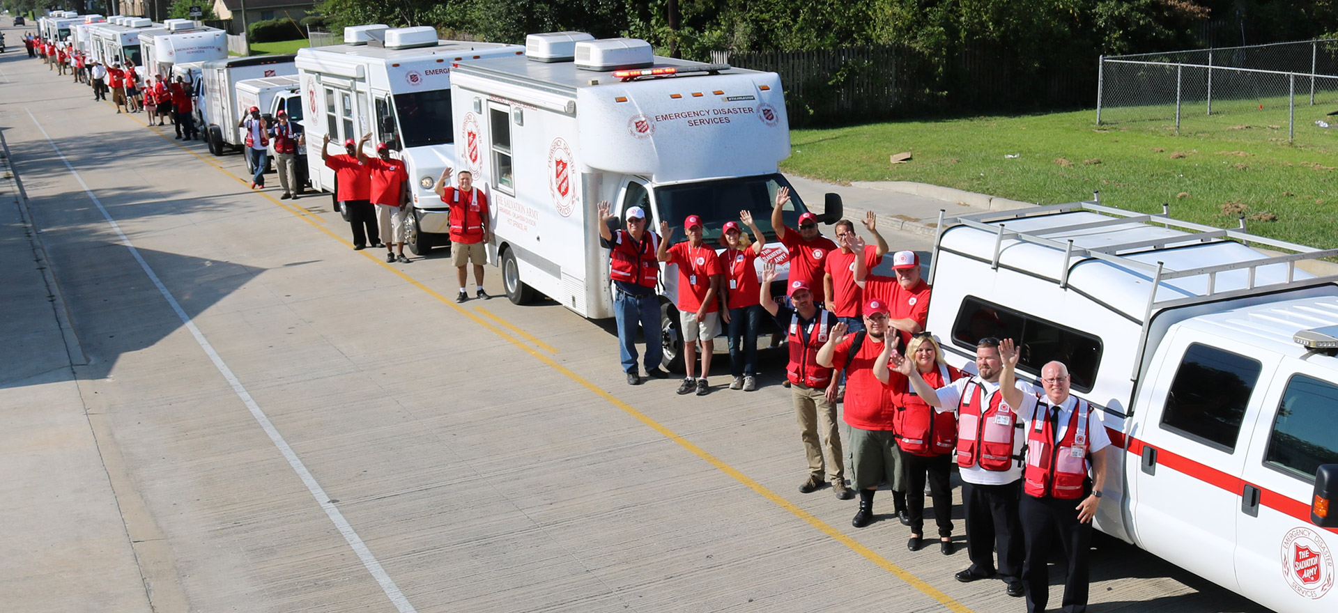 Salvation Army workers waving